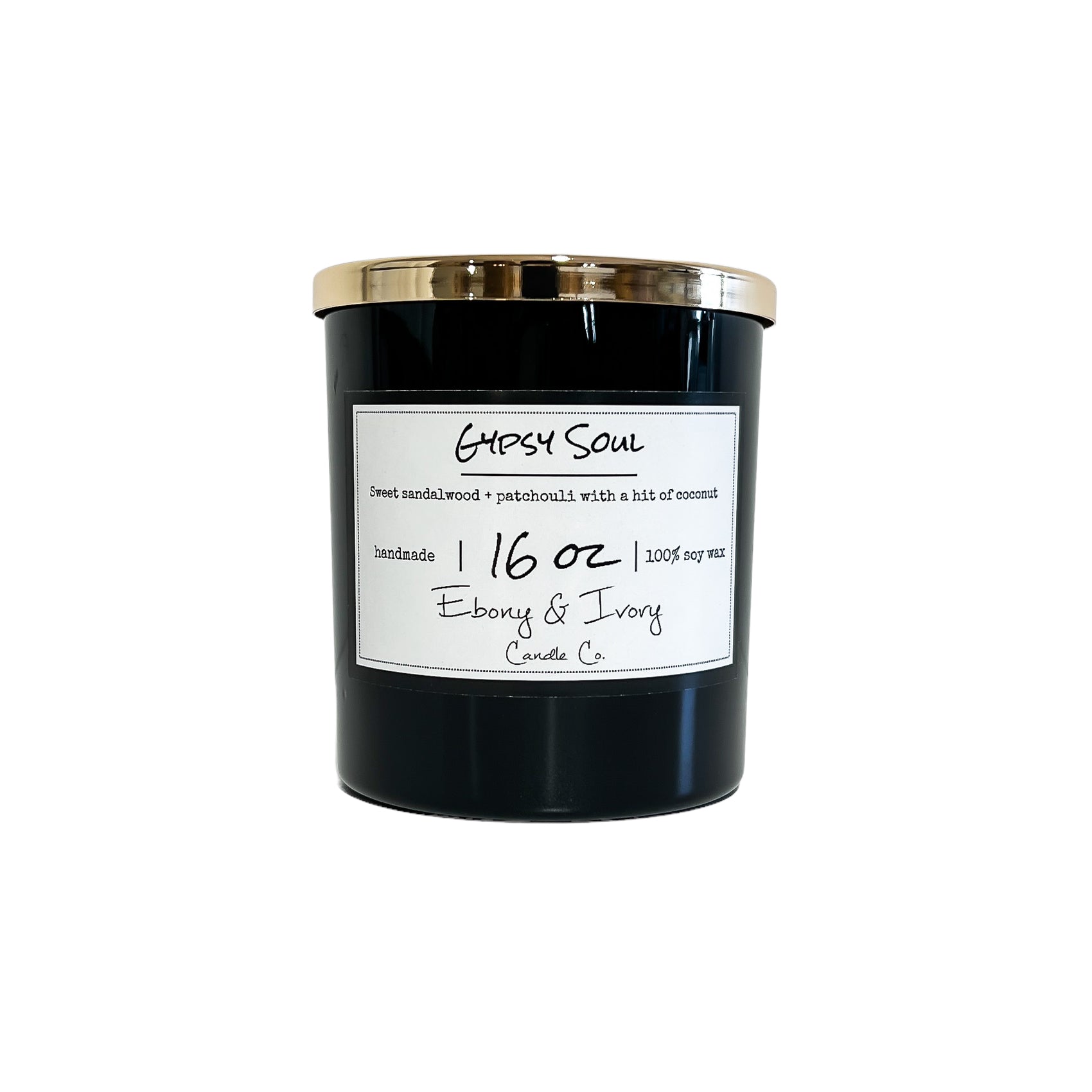Black, sixteen ounce, Sandalwood, Patchouli, and coconut scented soy wax candle with a gold lid and a white label that reads Gypsy Soul
