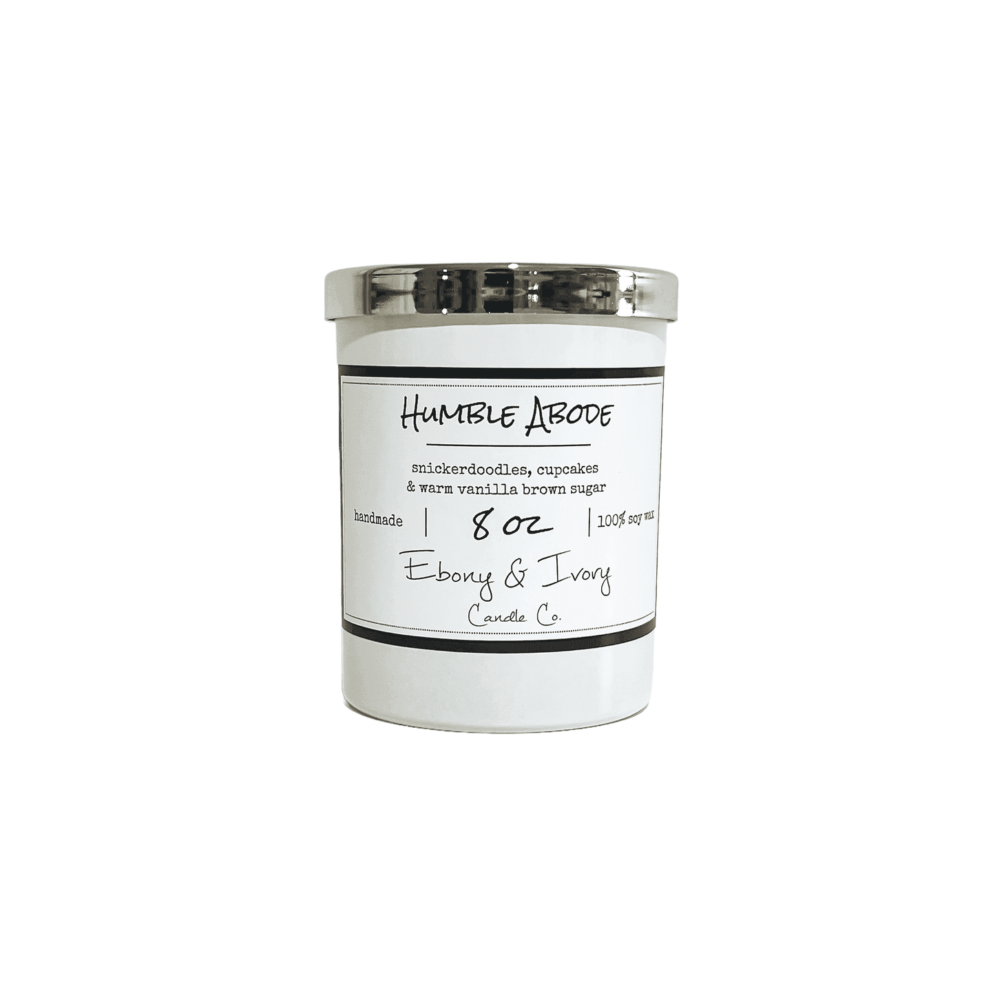 A white 8oz jar soy candle with a gold lid and a white label named Humble Abode, on a white background, made by Ebony & Ivory Candle Co in Lethbridge, Alberta, Canada