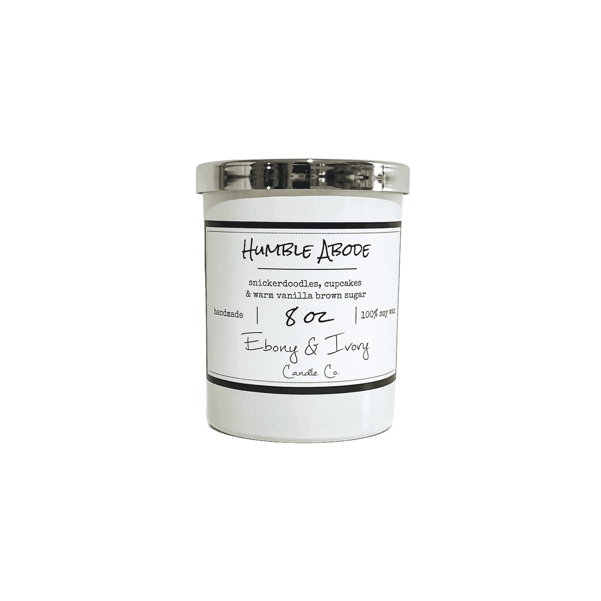 White, eight ounce, snickerdoodle, cupcake, vanilla, and brown sugar scented soy wax candle with a gold lid and a white label that reads Humble Abode