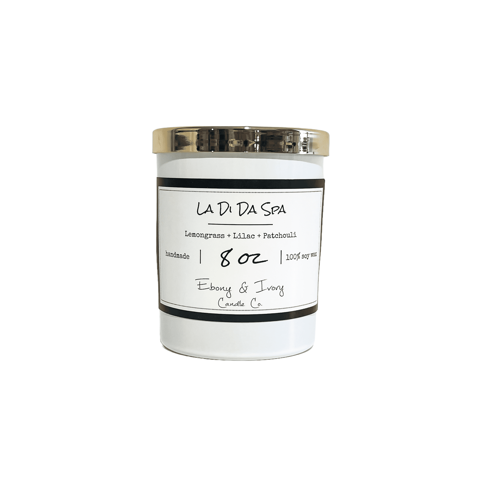 White, eight ounce, lemongrass, lilac, and patchouli scented soy wax candle with a gold lid and a white label that reads La Di Da Spa