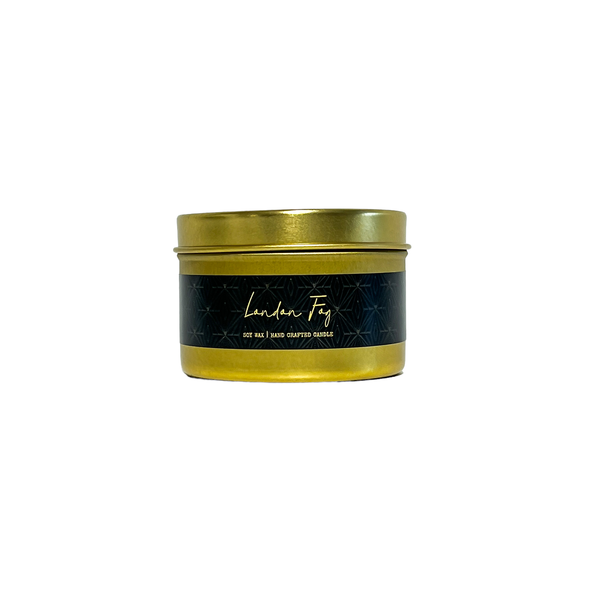 Gold, four ounce, bergamot and vanilla scented soy wax candle with a gold lid and a black label that reads London Fog