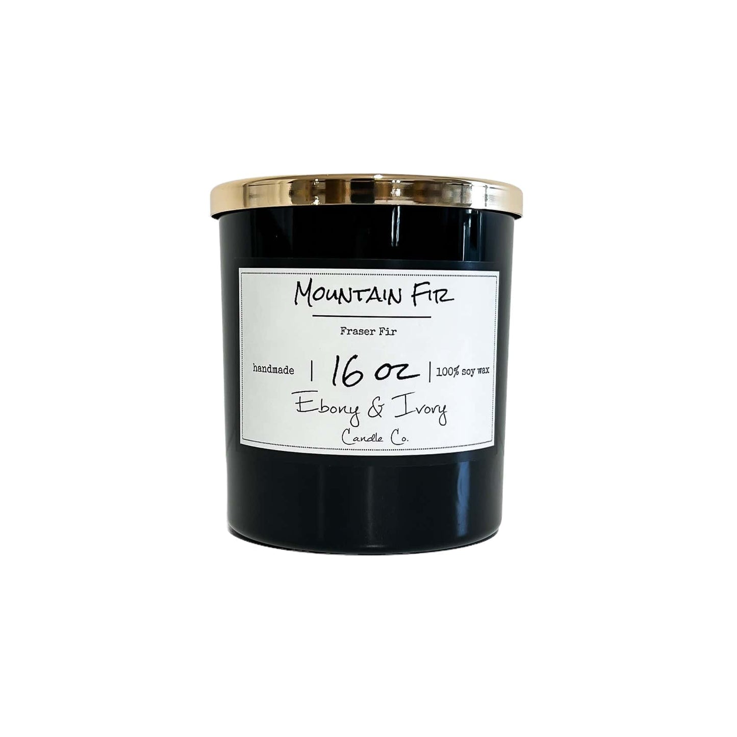 A black jar 16oz soy candle with a gold lid and a white label named Mountain Fir, on a white background, made by Ebony & Ivory Candle Co in Lethbridge, Alberta, Canada