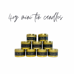 pyramid of nine gold 4 ounce tin candles with black labels. text at the top says 4 ounce mini tin candles. 