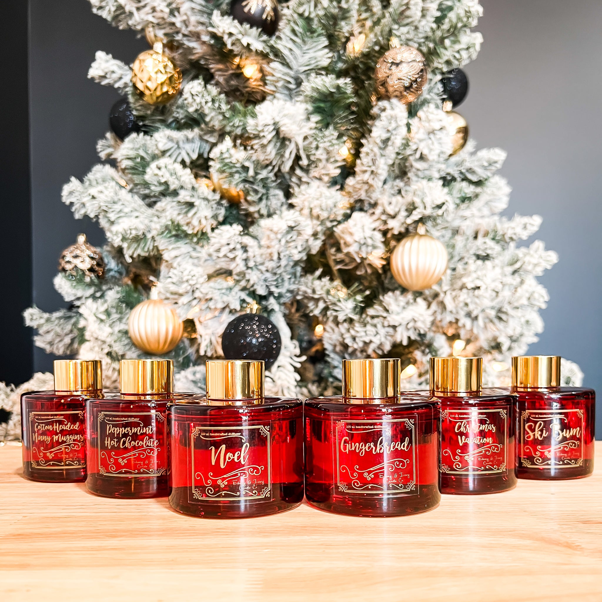 Ebony and Ivory Candle Co's red holiday christmas reed diffusers