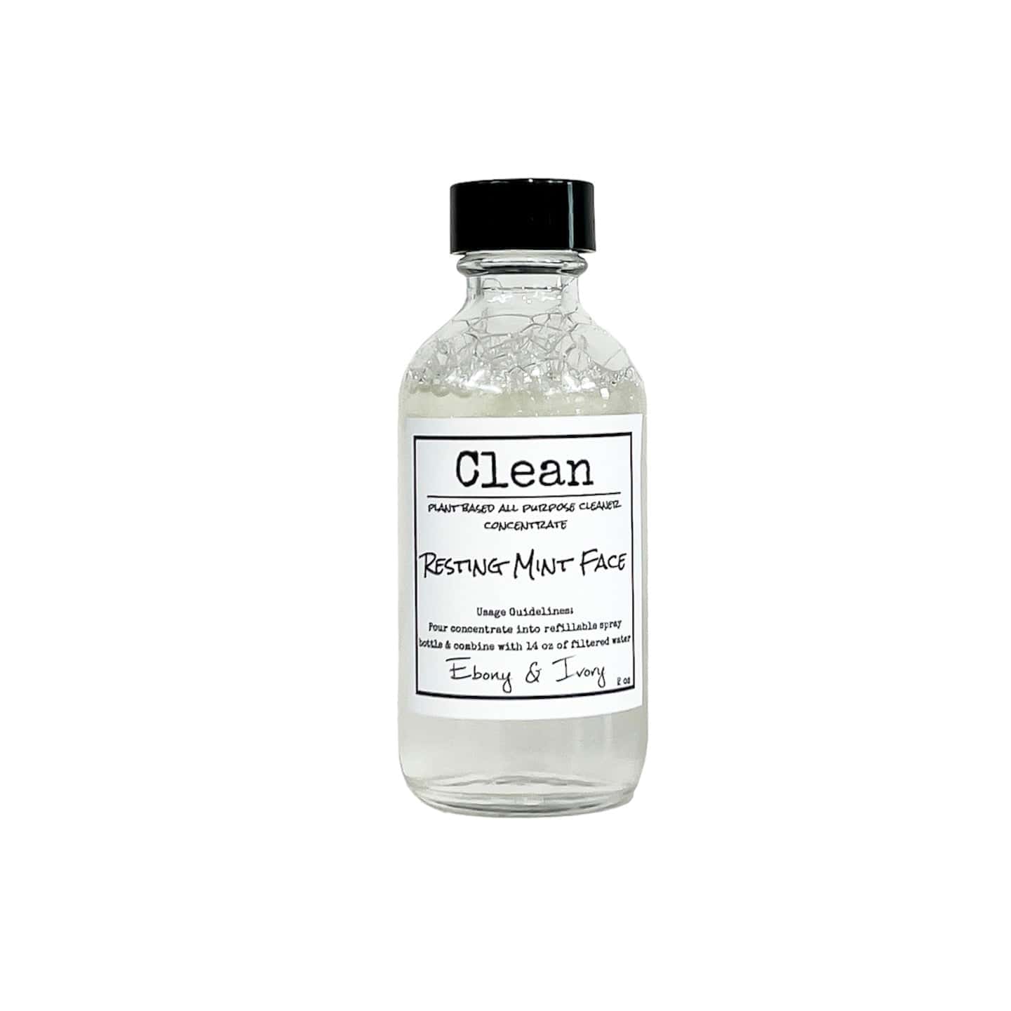 Clear two ounce bottle of mint and rosemary scented all purpose cleaner refill concentrate with a white label that reads Resting Mint Face 