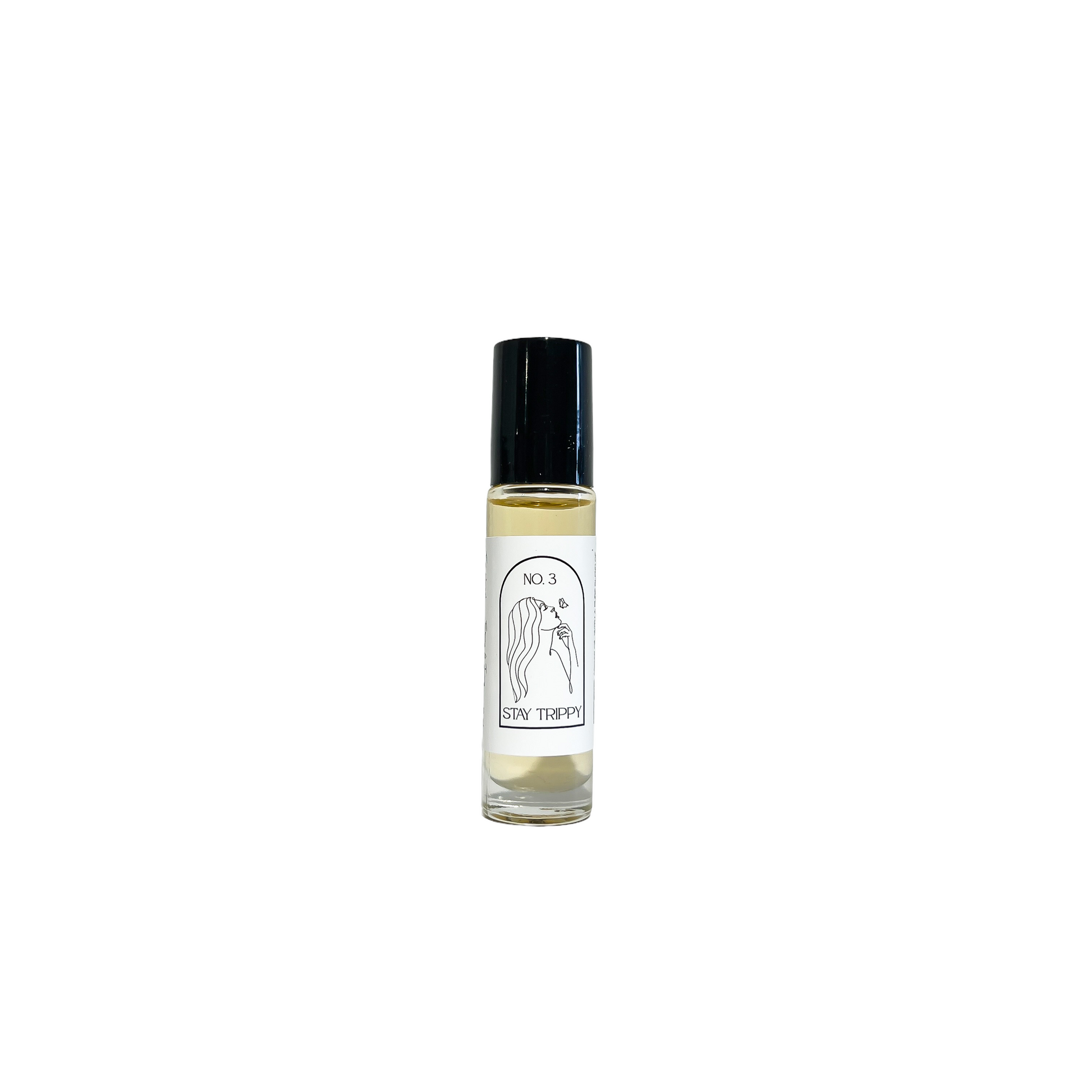 Clear glass, ten milliliter, Sandalwood, Patchouli, and coconut scented roll-on applicator with a black lid and a white label that reads Stay Trippy