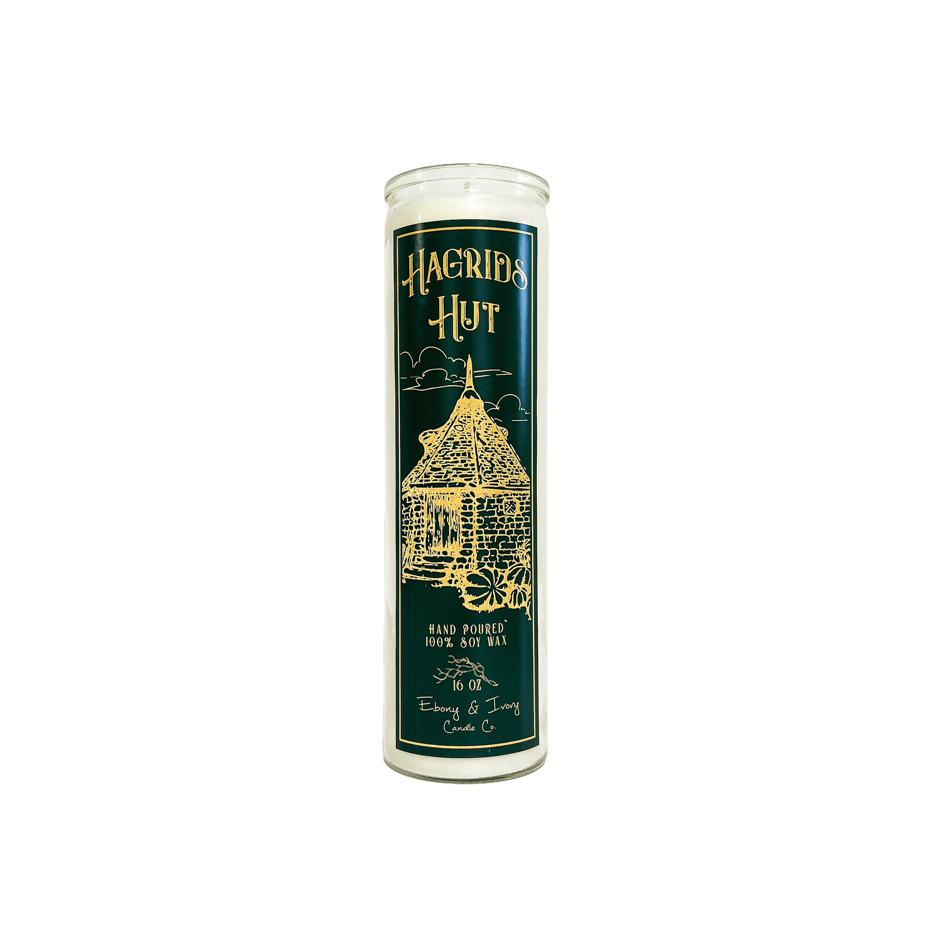 Tall, clear glass, bergamot, woodys, mahogany, and musk scented soy wax candle with a dark green label and gold text that reads Hagrids Hut