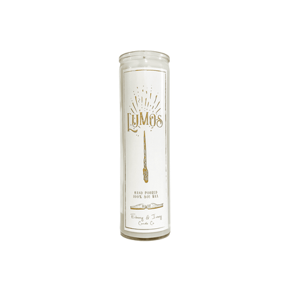 Tall 16oz clear glass jar soy candle with a green label named Lumos, on a white background, apart of the wizarding candle collection made by Ebony & Ivory Candle Co in Lethbridge, Alberta, Canada